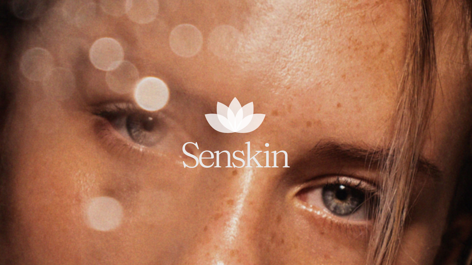 Senskin logo superimposed on model's face.